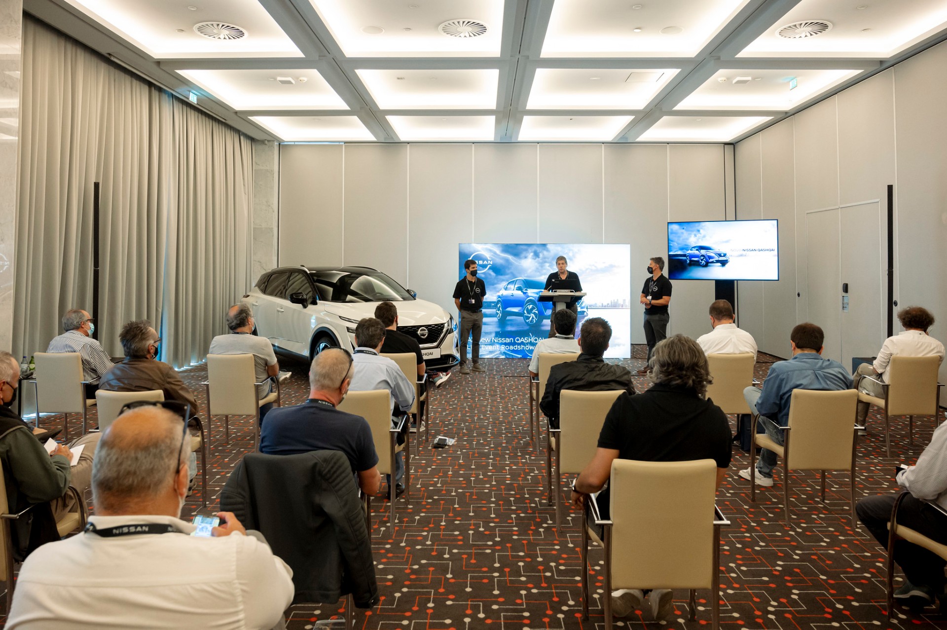 Apresentação do Nissan Qashqai em sala de hotel